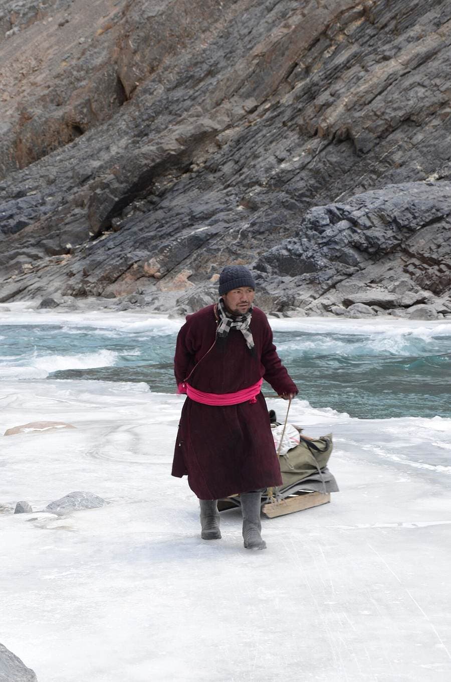 Trekkers crossing the frozen Zanskar river on the Chadar trek